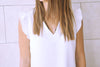 White Sleeveless Ruffle Trim Top